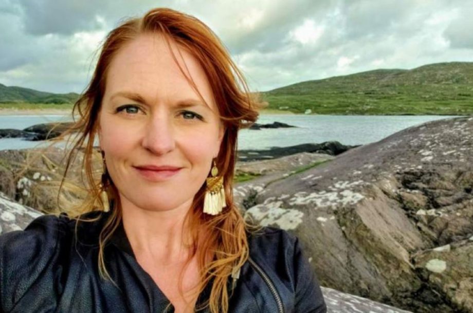 Anna Brittain in front of rocks and water
